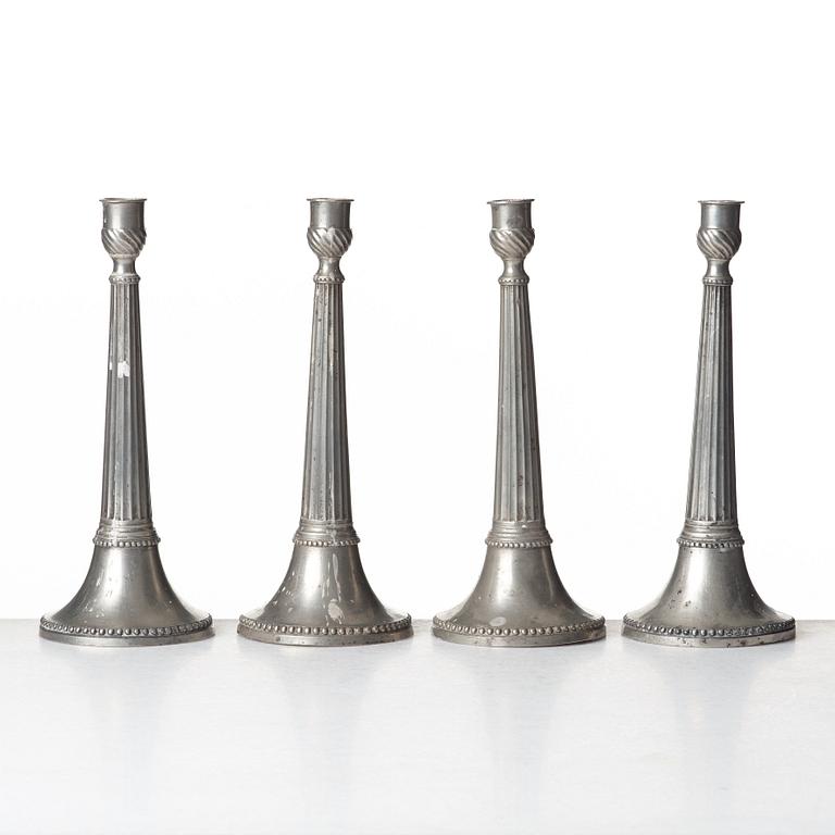 A set of four Swedish late Gustavian pewter candlesticks by E P Krietz, made in Stockholm.