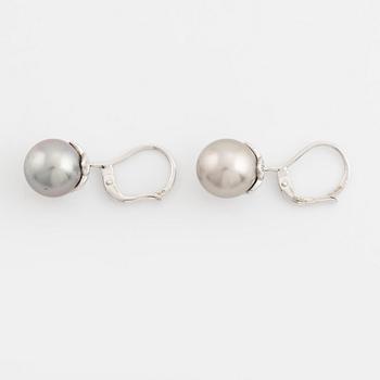 A pair of cultured pearl and brilliant cut diamond earrings.
