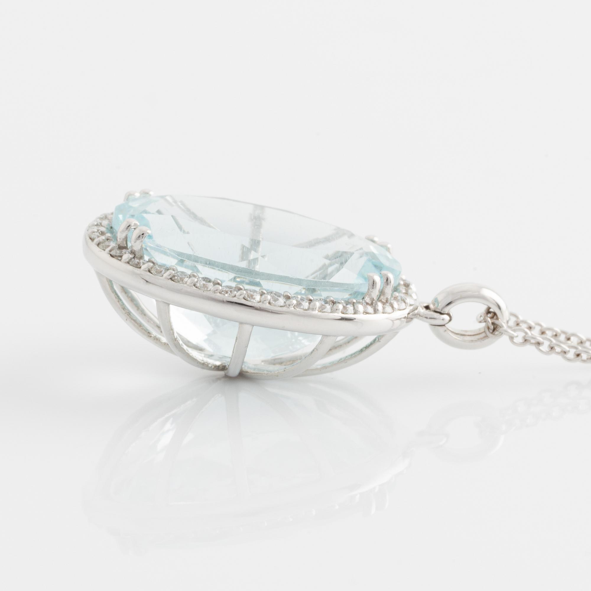Pendant with oval aquamarine and brilliant-cut diamonds, with chain.