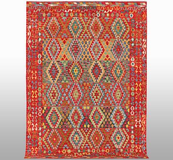 A carpet, kilim, ca 297 x 202 cm.