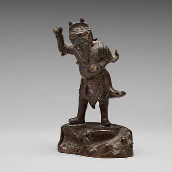 594. A bronze figure of a deity, Qing dynasty, 17/18th Century.
