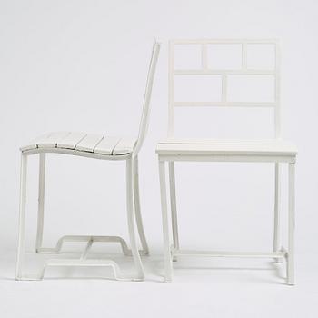 Carl Hörvik, a pair of white lacquered iron garden chairs, possibly manufactured by Thulins vagnsfabrik, Sweden.