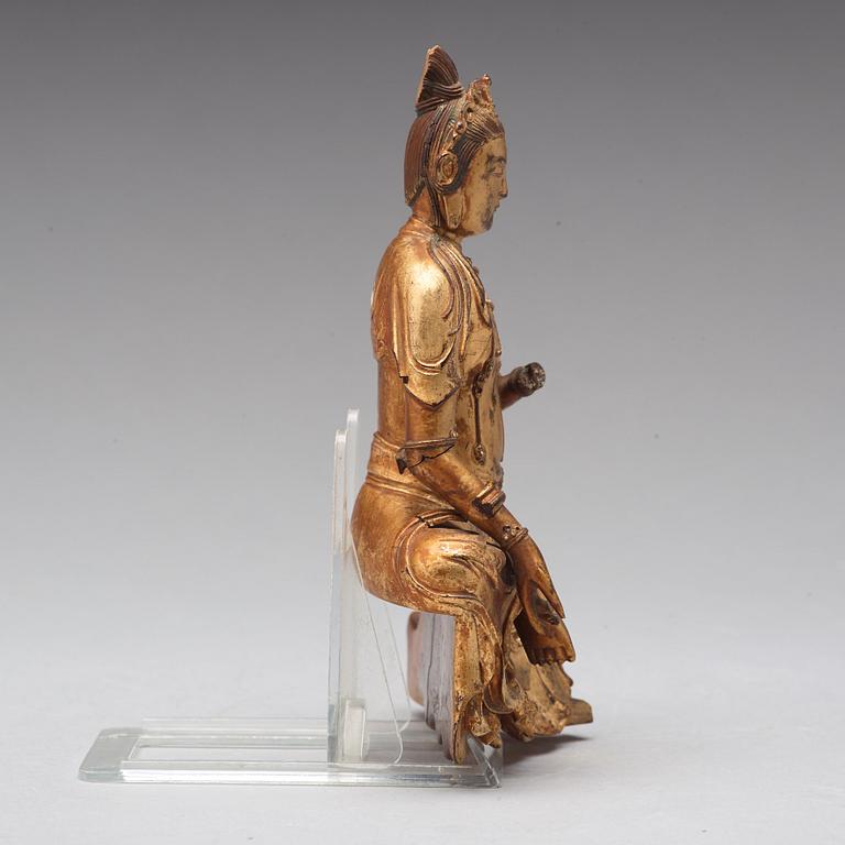 A lacquered wooden figure of Guanyin, 17th/18th Century.