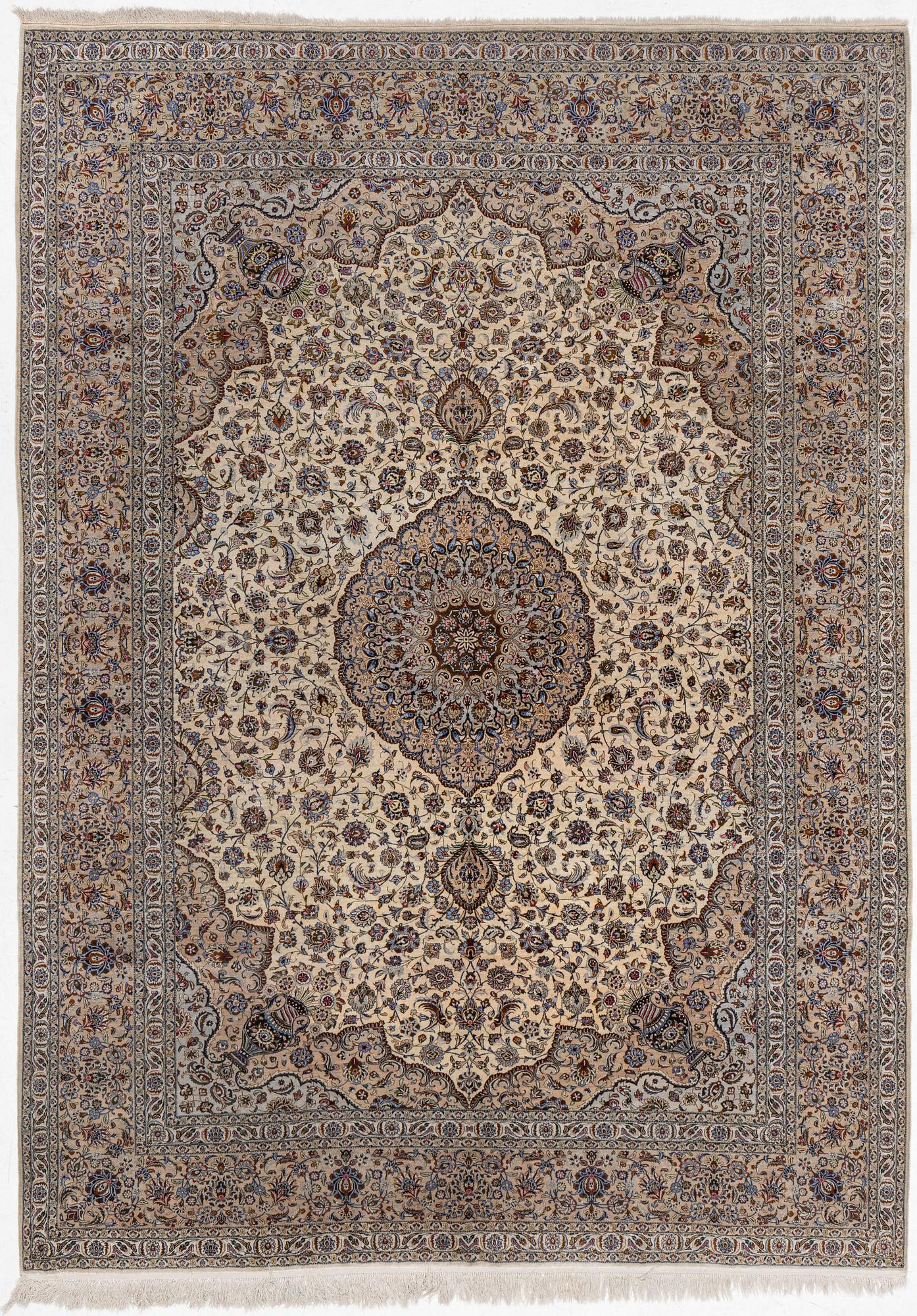 A semi-antique silk Keshan carpet, c. 350 x 248 cm.