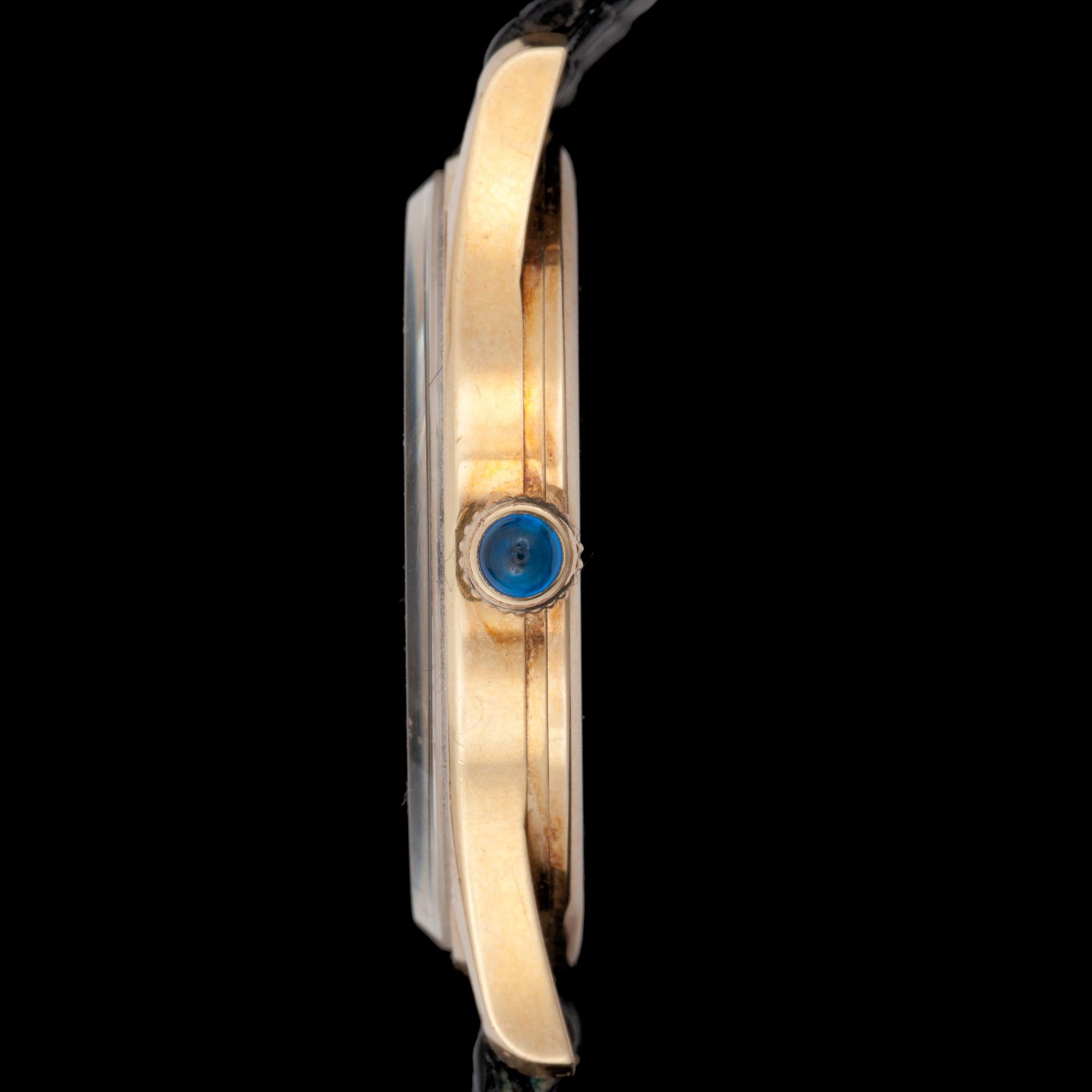 Cartier. Guld. Manuell. Ø 31 mm. ca 1978.