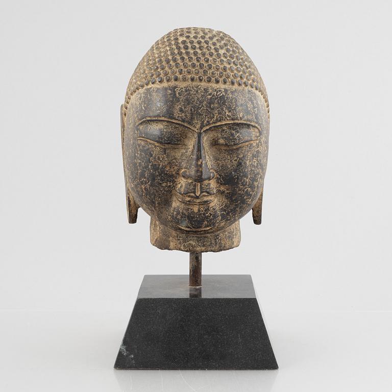 A Buddha's head, stone. Ming style.