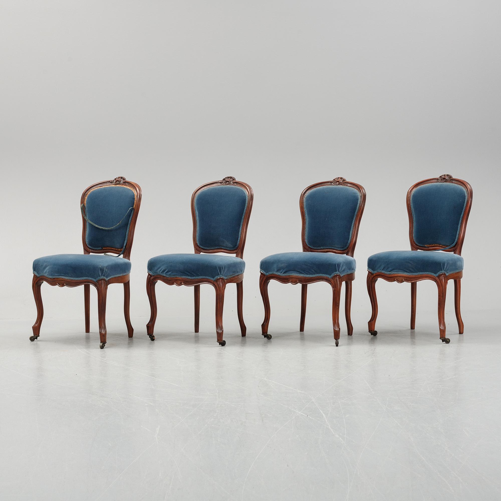 A sofa and a set of four chairs, Rococo revival, late 19th century.