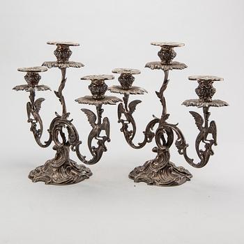 A pair of Swedish silver candelabra mark of GUSTAF MÖLLENBORG Stockholm 1846 , total weight ca 4420 gr, height 31 cm.