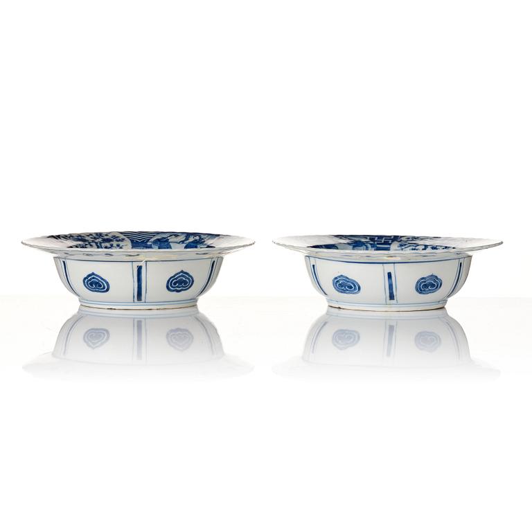 A pair of blue and white Kangxi style dishes, 19th Century.