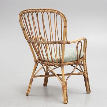 A wicker chair, mid 20th century.