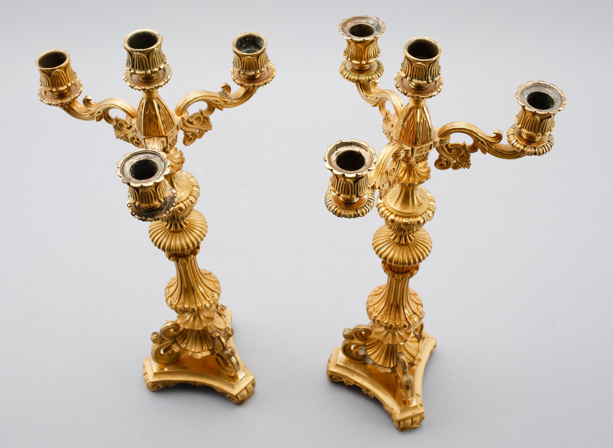 KANDELABRAR, 2 st, förgylld brons, senempire, 1800-talets mitt.