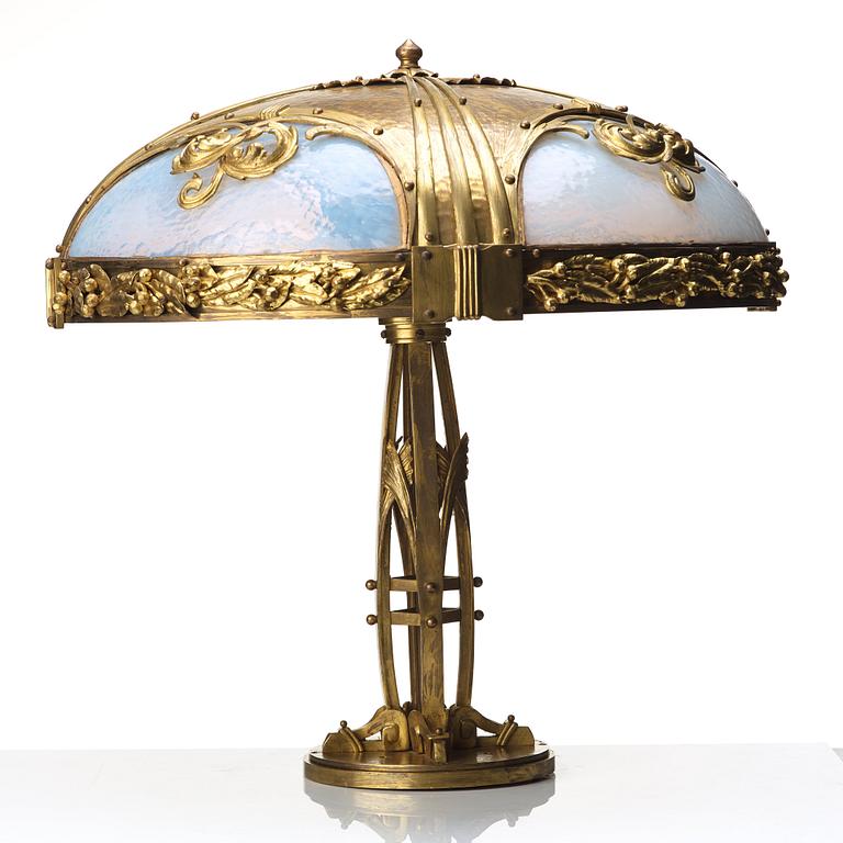 An Art Nouveau bronze table lamp, early 20th century.