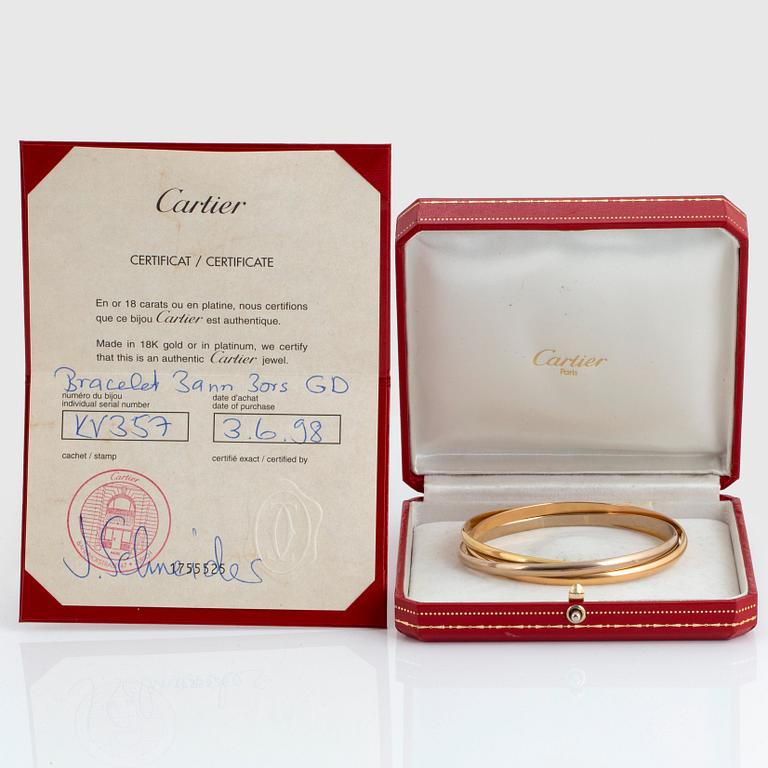 A Cartier "Trinity" bangle.