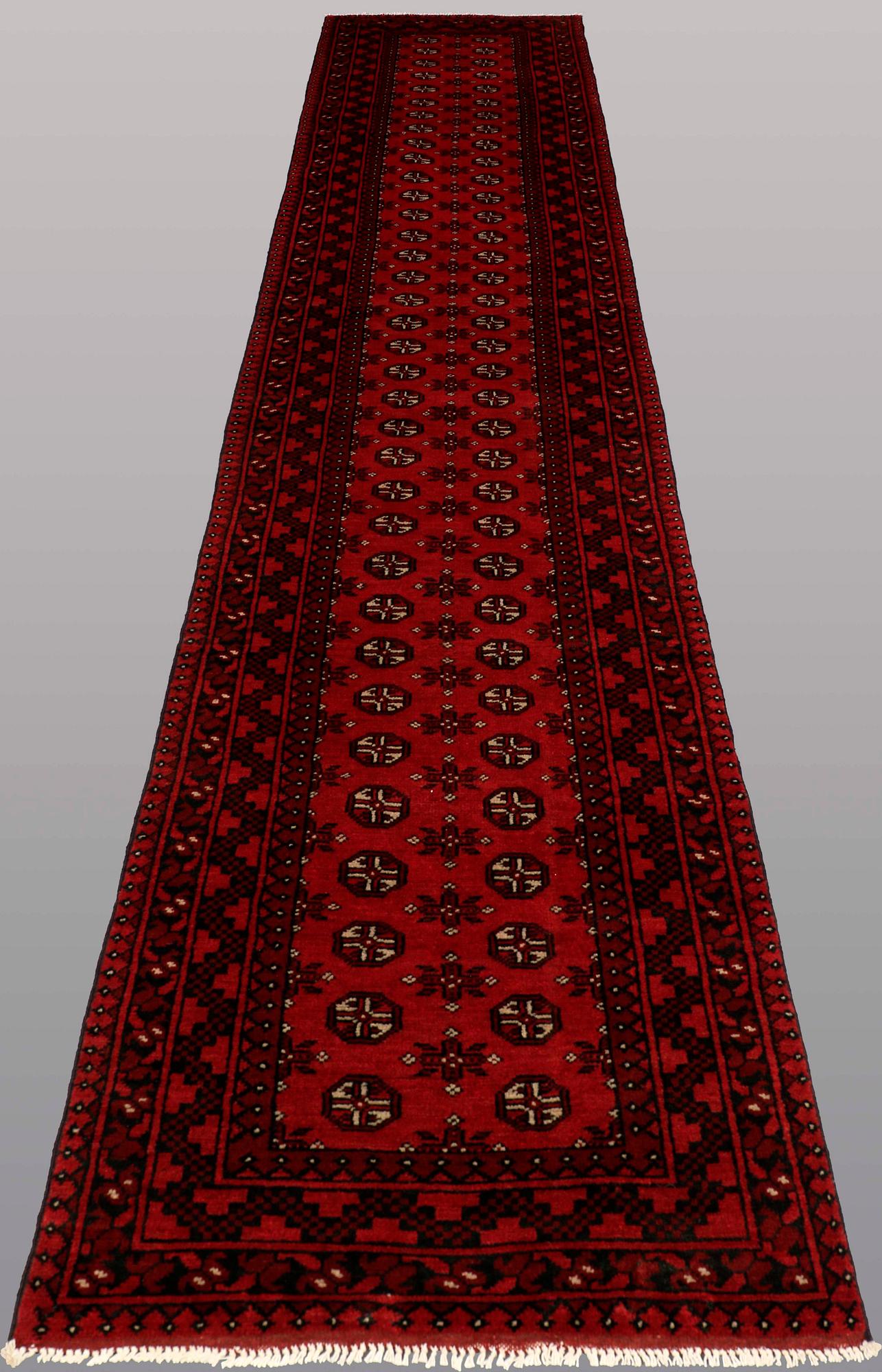 A RUNNER, Afghan, ca 498 x 83 cm.