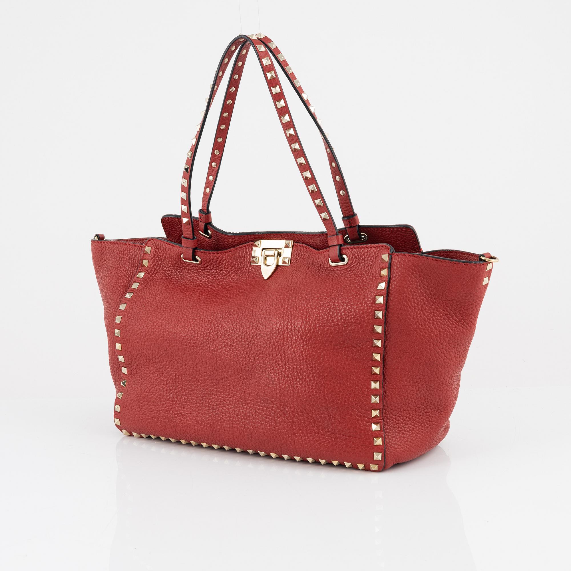 Valentino Gravani, a red leather studded tote bag, 2018.