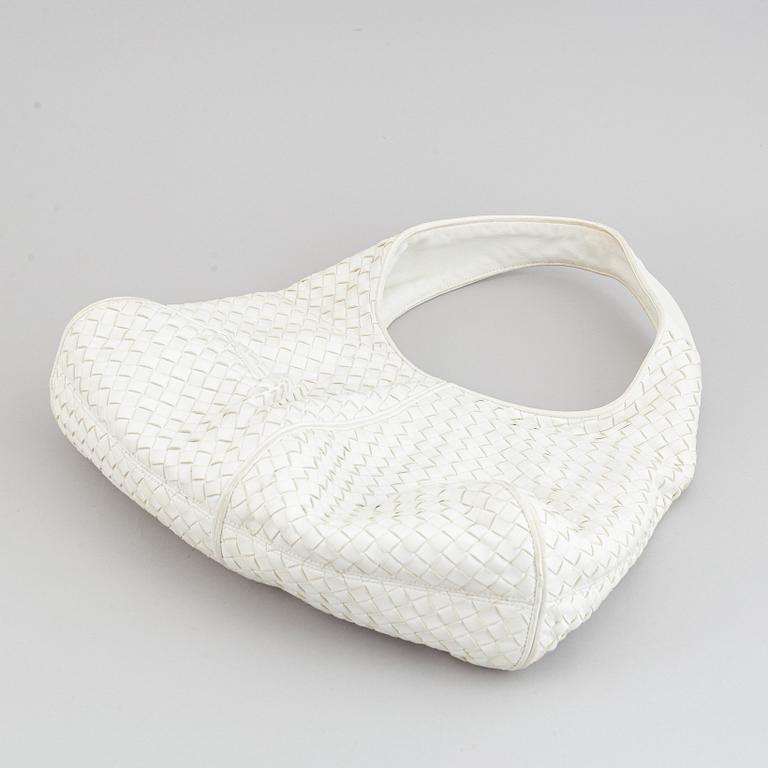Bottega Veneta, a white intrecciato leather hobo bag.