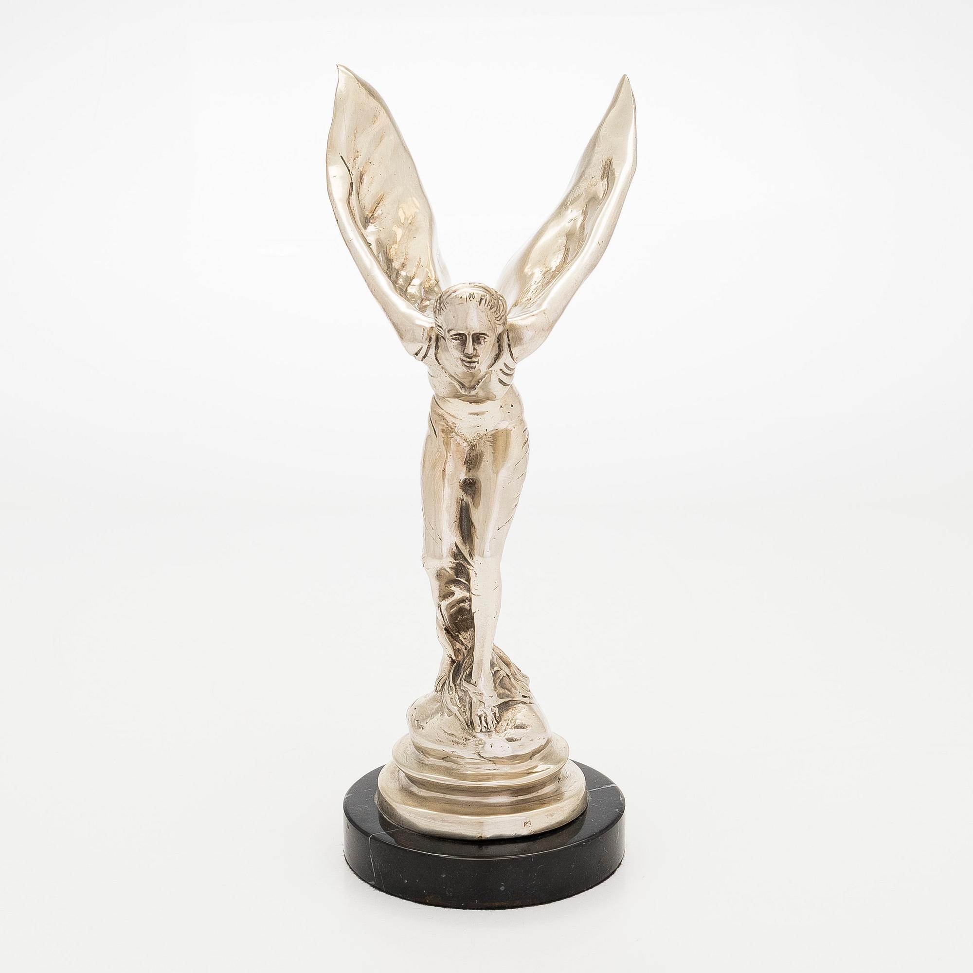 Skulptur, "Spirit of Ecstacy", symbol för Rolls-Royce, 1900-tal.