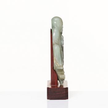 A carved nephrite sculpture of a lohan, Qing dynasty (1664-1912).