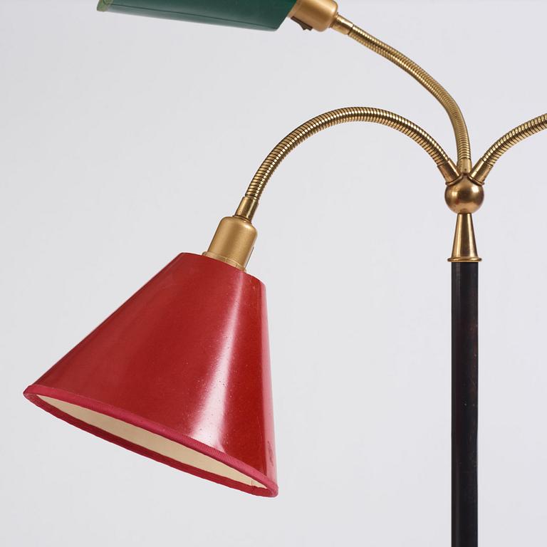 Josef Frank, a brass and black lacquered floor lamp model "2431", Firma Svenskt Tenn, Sweden.