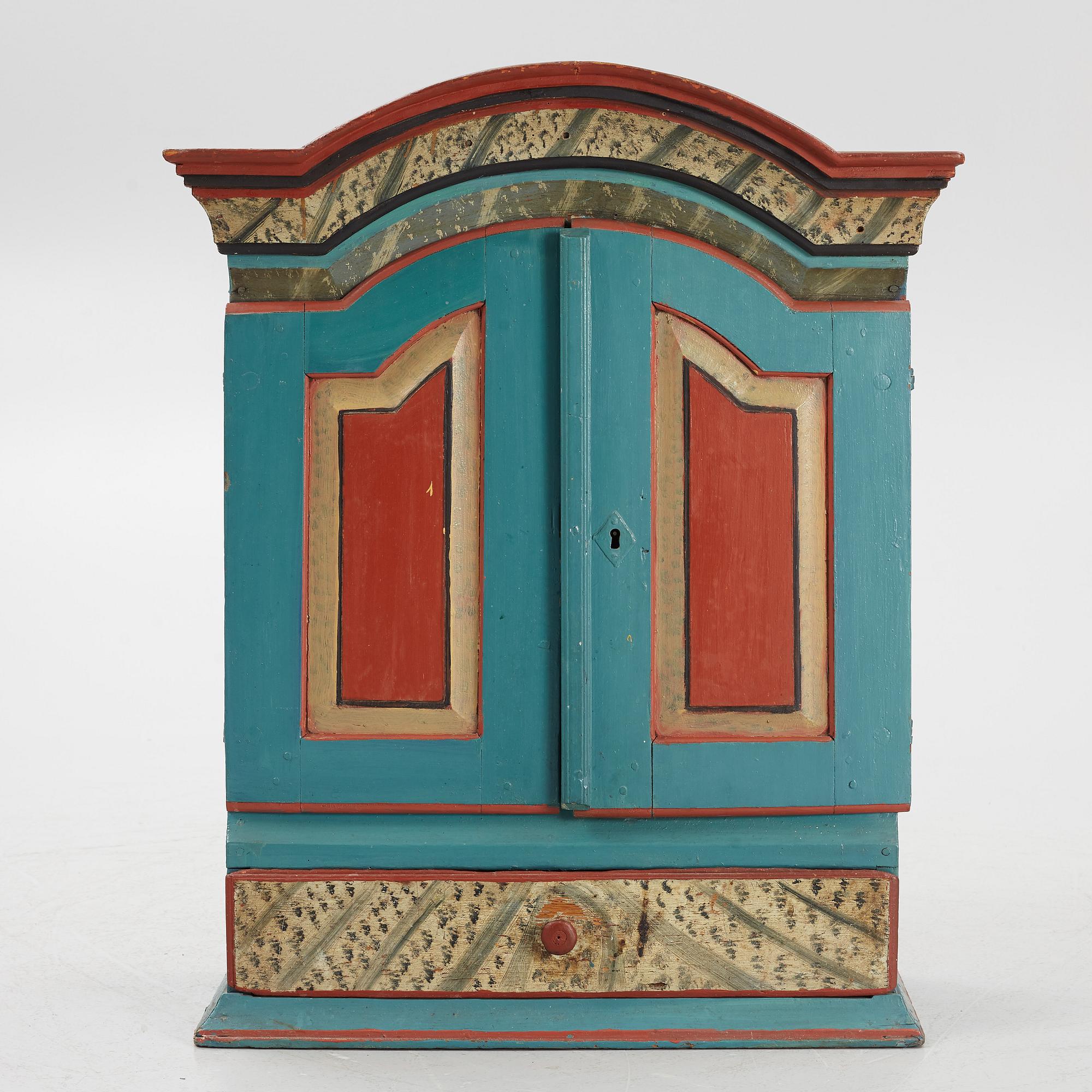 A Swedish provincial wall cabinet, possibly from Dalarna, early 19th century.