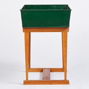 Josef Frank, a rare flower table with green lacquered box model B 2084, Firma Svenskt Tenn, 1950-60s.