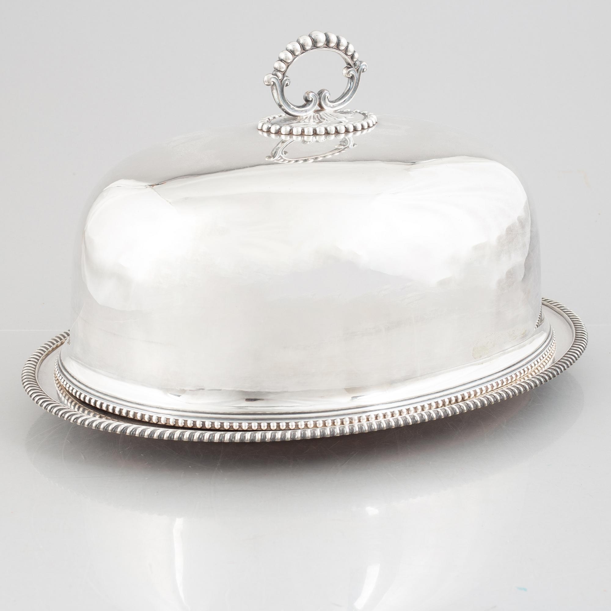 A silver plate food dome cover, Atkin Brothers, Sheffield, England, and a dish, circa 1900.