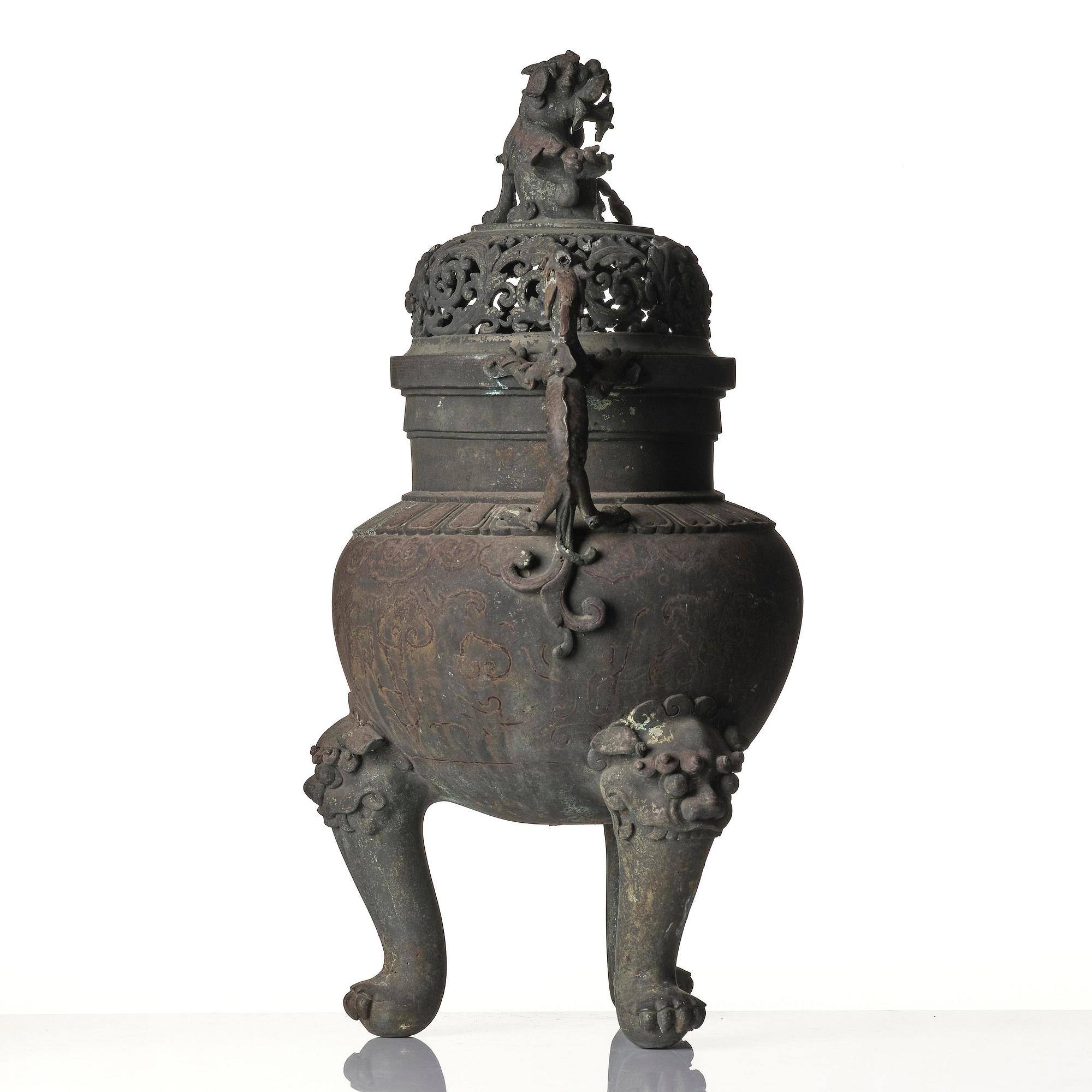 A large tripod bronze censer with pierced cover, late Ming/early Qing dynasty.