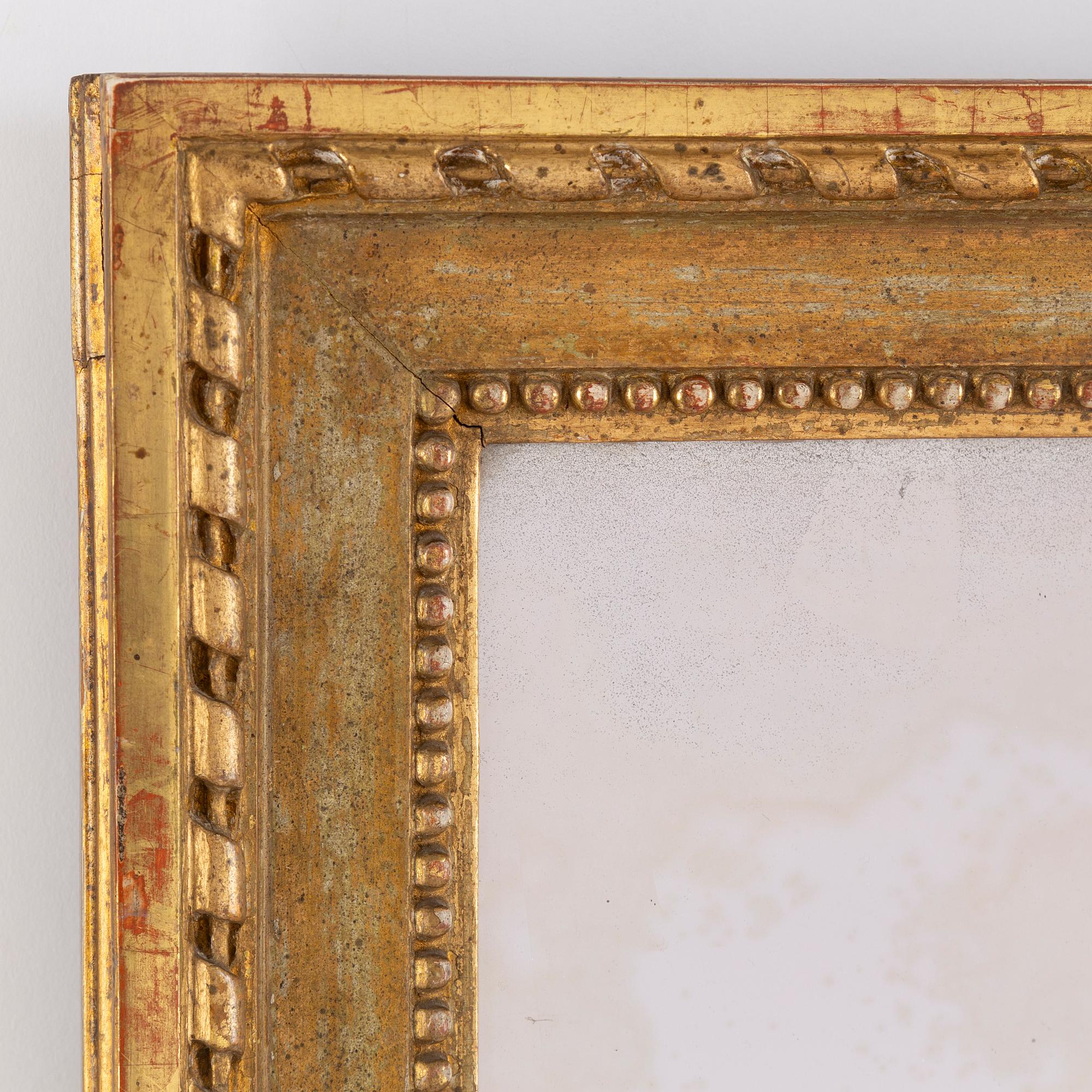 A Gustavian 2-light girandole mirror, late 18th century.