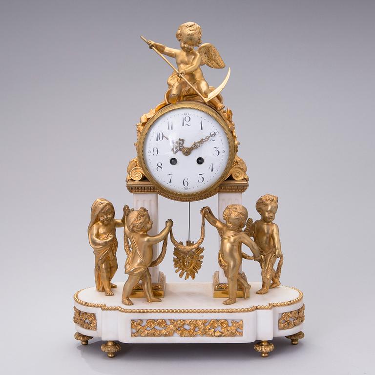 A neoclassical, French mantel clock, ca 1840-1860.