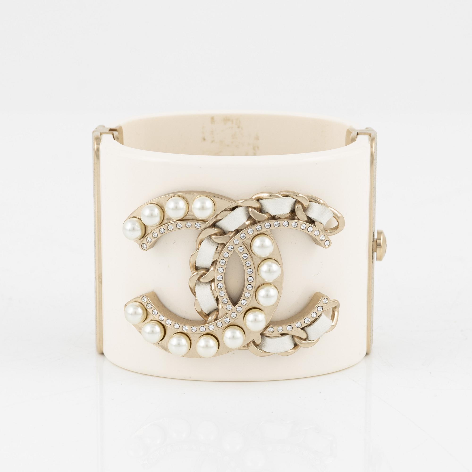 Chanel, a white acrylic bracelet with pearls, 2019.