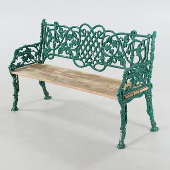 An early 20th century garden sofa.