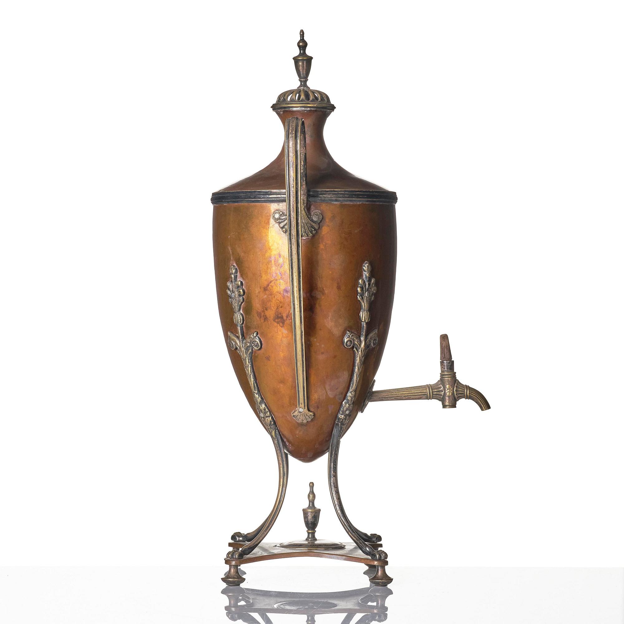 A George III copper and silvered-brass hot water urn, late 18th century.