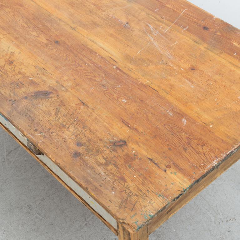 An early 20th century pine table.