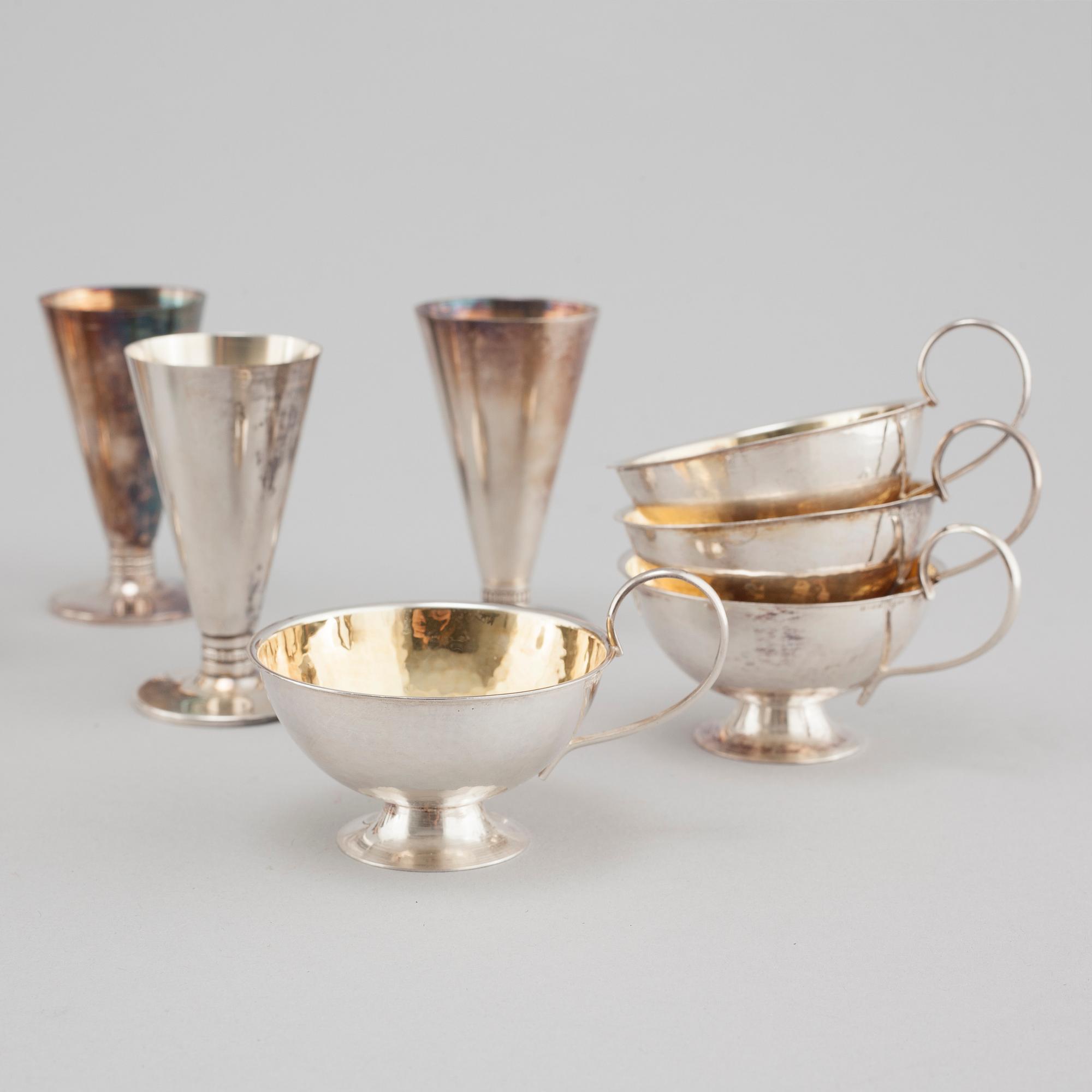 16 pieces of silverware, mostly Sweden, around the mid 20th century.