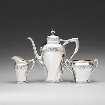 A C.G. Hallberg three pieces Art Nouveau silver coffee service, Stockholm 1904-1905.