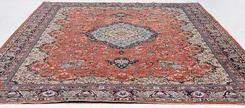 An oriental carpet, c. 370 x 275 cm.