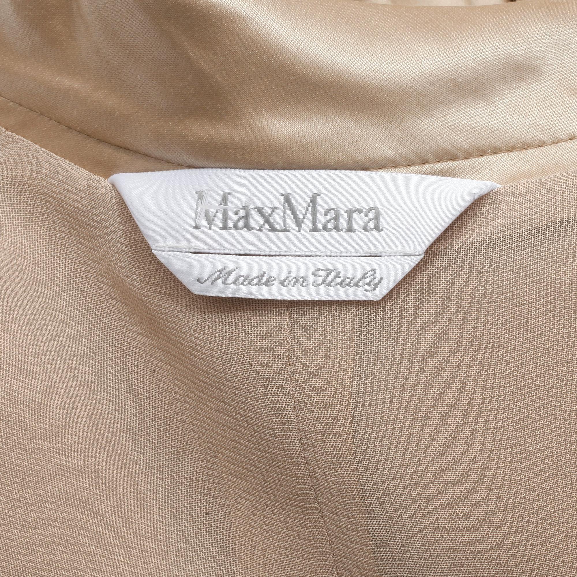 MAX MARA, dräkt bestående av väst samt byxa. Storlek 40 resp 42.