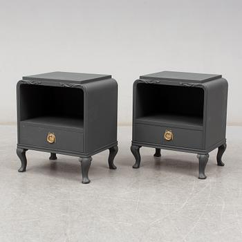 A pair of mid 20th century painted bedside tables.