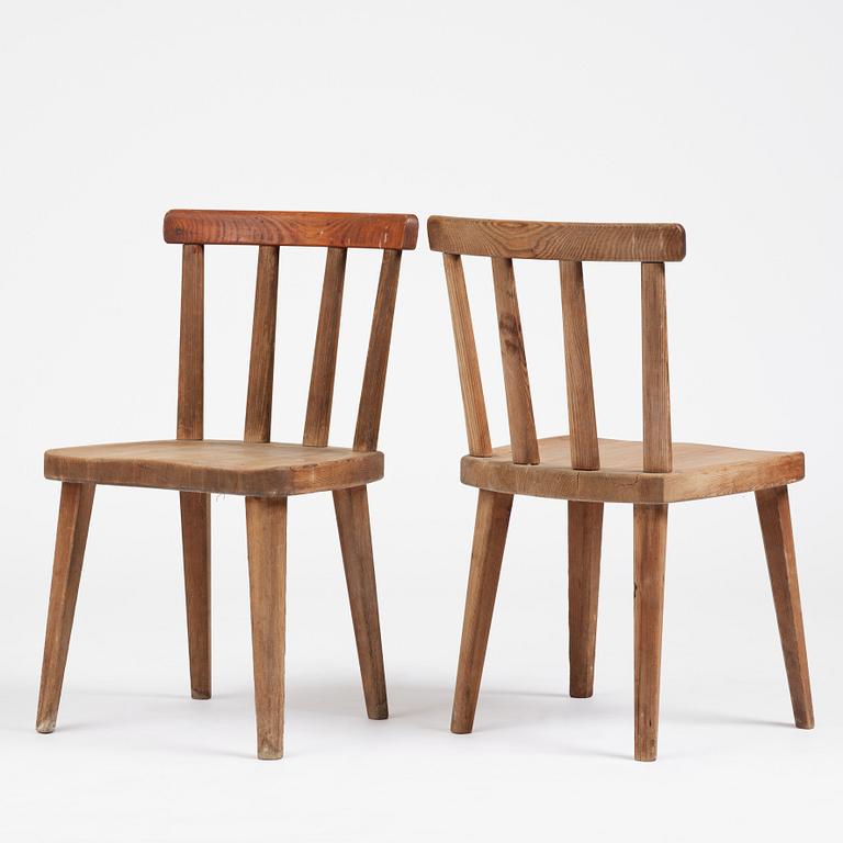 Axel Einar Hjorth, a set of four stained pine "Utö" chairs, Nordiska Kompaniet, Sweden, 1930s.