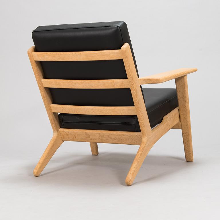 Hans J Wegner, a 2004 'GE-290' armchairs for Getama.