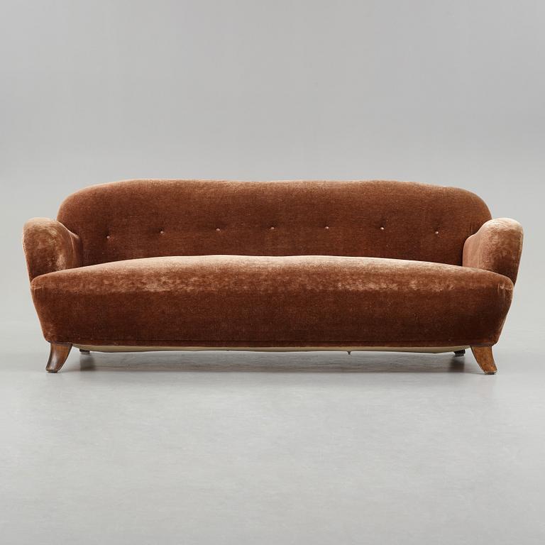 A Mid Century Modern sofa, probably ca 1939.