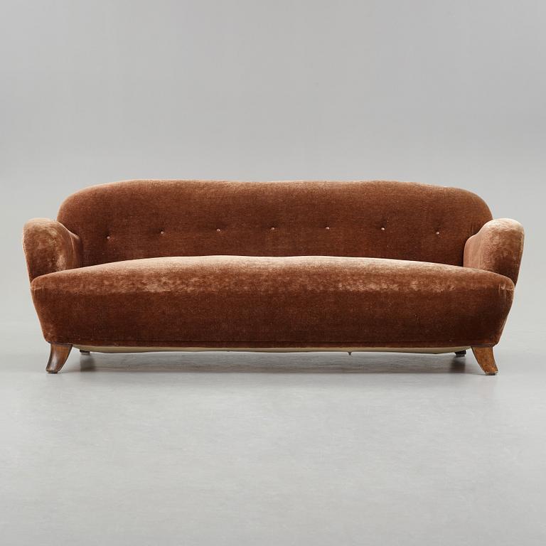 A Mid Century Modern sofa, probably ca 1939.