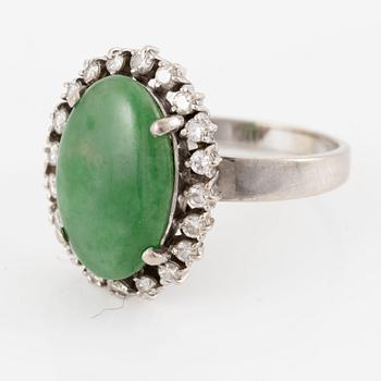 Ring, 14K white gold set with cabochon-cut probably jadeite and small brilliant-cut diamonds.