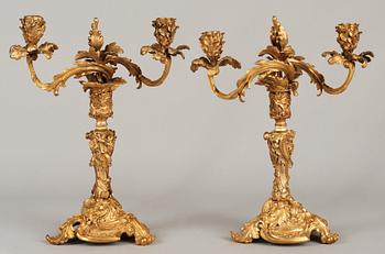 A pair of French Neo Rococo mid 19th century two-light candelabra.