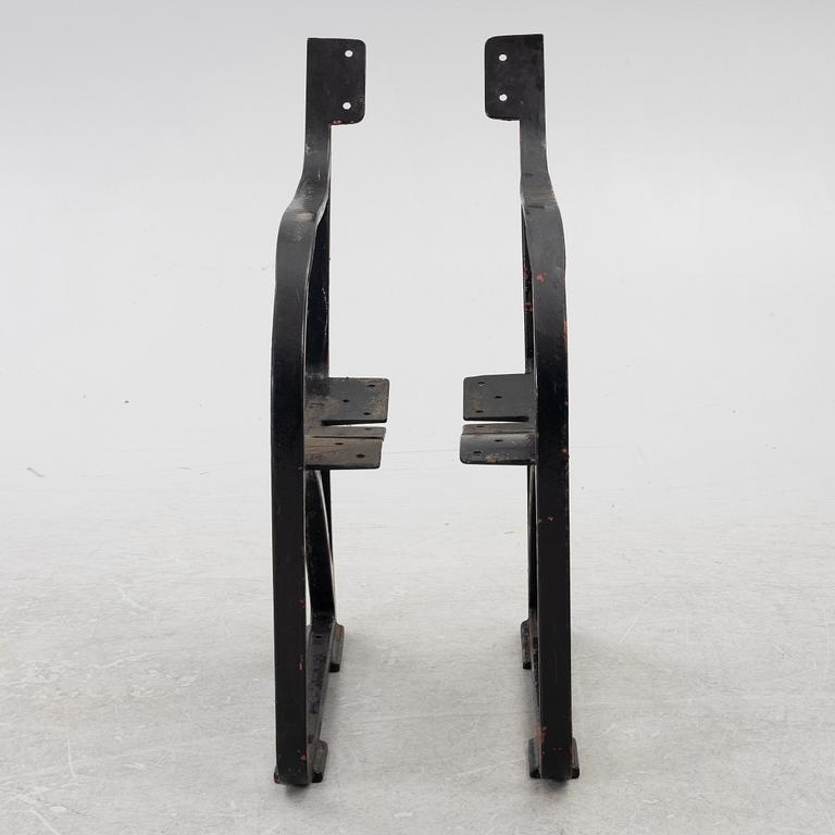 Näfveqvarn, ends for a bench, cast iron, early 20th century.