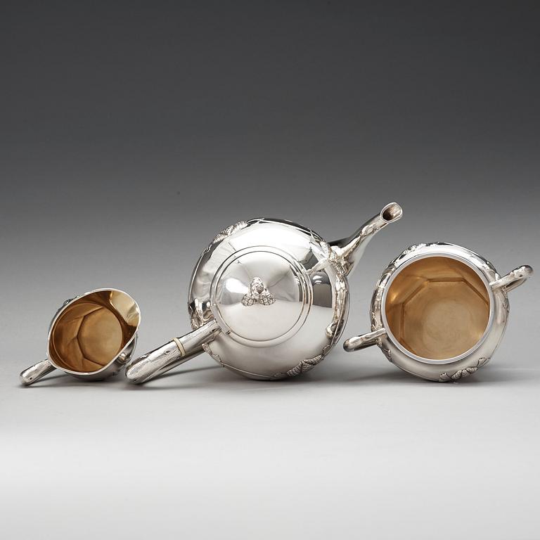 A C.G. Hallberg three pieces Art Nouveau silver coffee service, Stockholm 1904-1905.