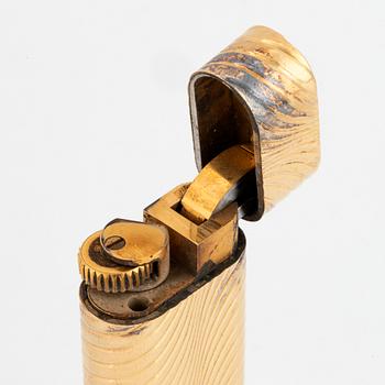 Cartier lighter ,with case 18K gold, Elon Arenhill.