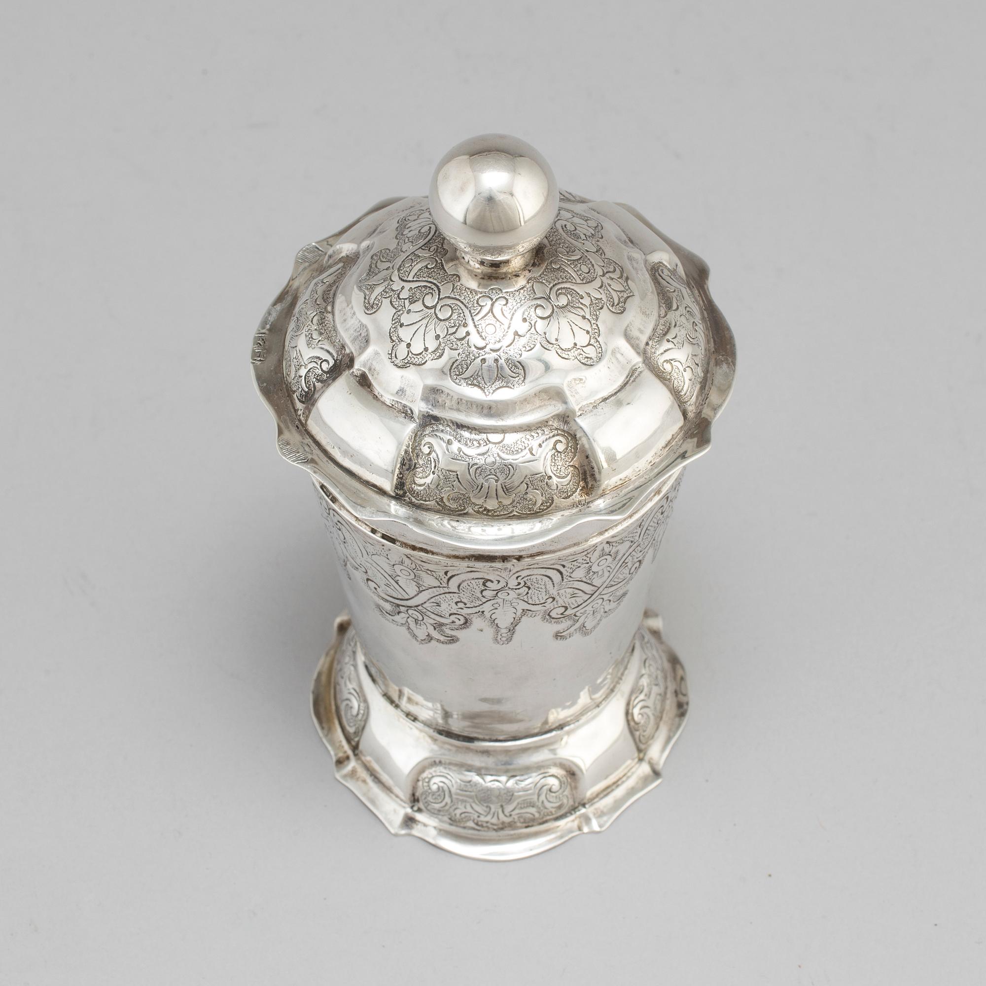 An 18th century silver beaker and cover, fantacy marks like Swedish pewter marks.