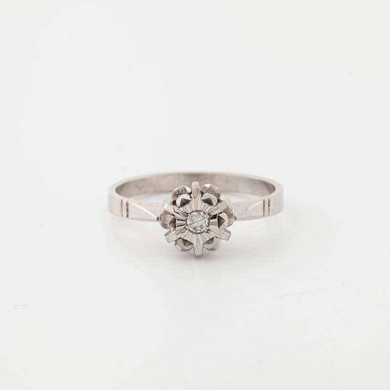 A single cut diamond ring.