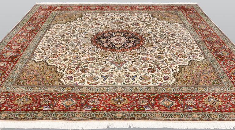 A part silk Tabriz carpet, sk 50 Radj, ca 312 x 296 cm.